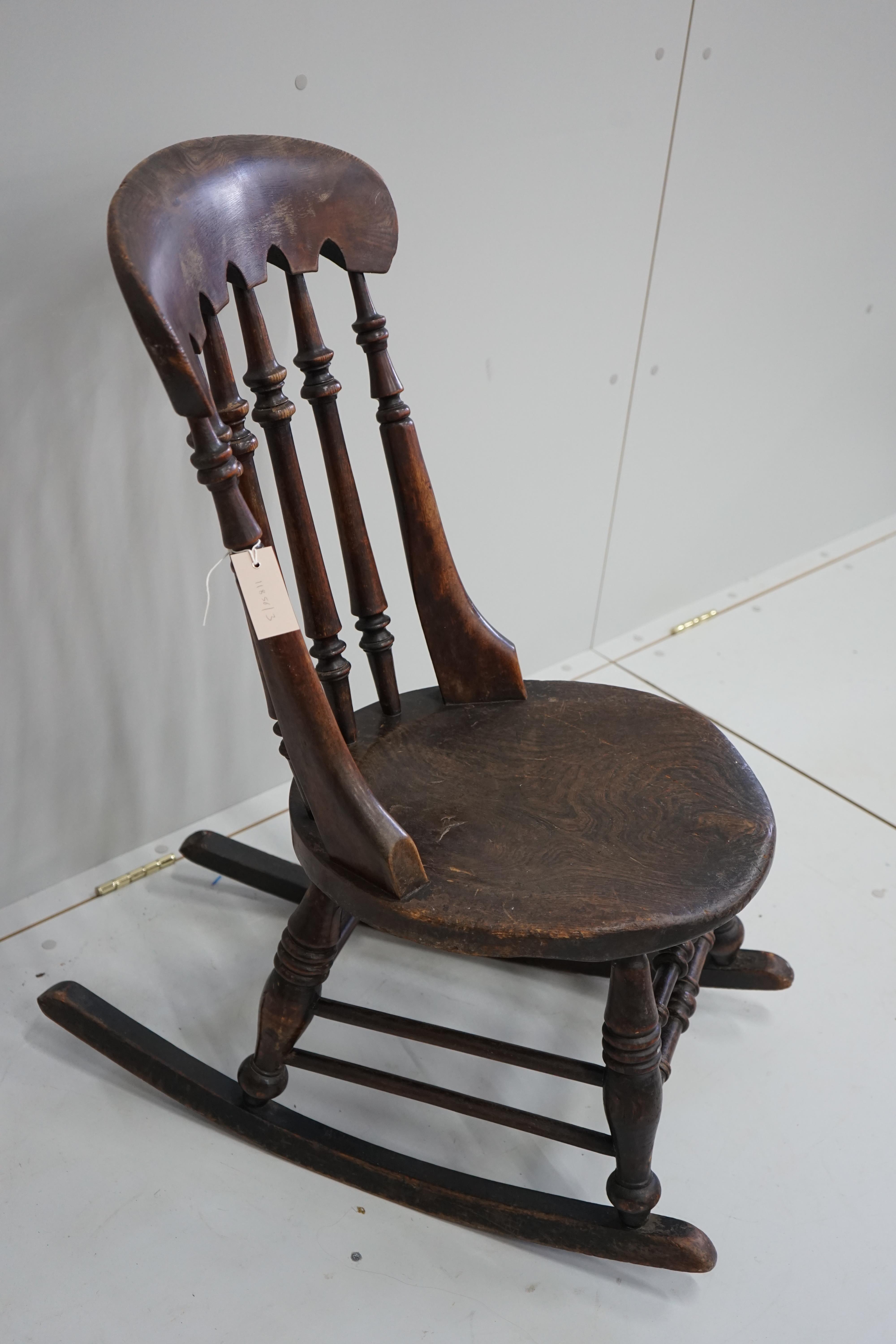 A Victorian elm and beech Windsor rocking chair, height 92cm